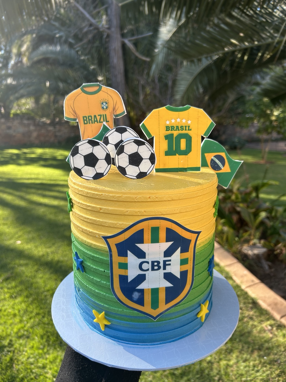 Yellow green and blue Brazil soccer celebration cake