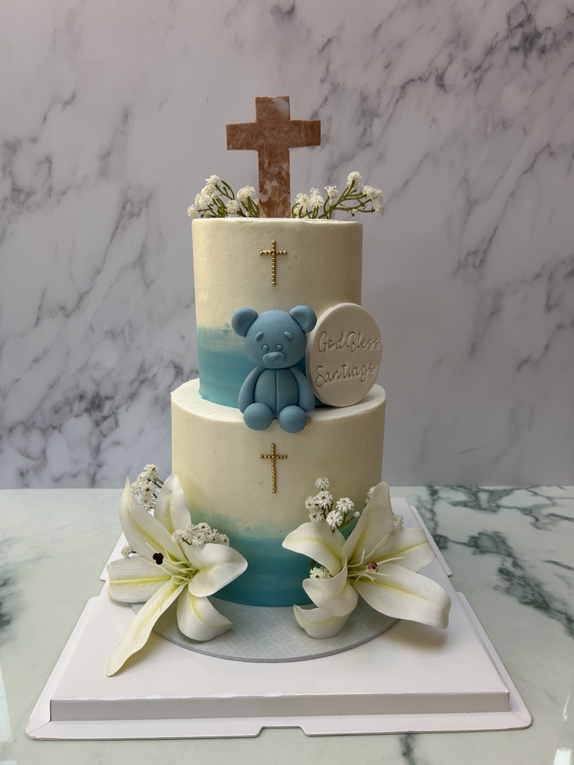 Blue teddy bear baptism cake for Santiago